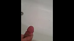 Big cock teen wanks freely into bathtub