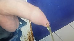 Teen boy pissing.