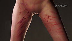 Petite redhead tied to a chair and punished