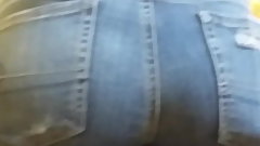 Firm college teen in jeans close up