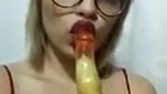 Lusty Whore Lucy sucking a Big Dildo