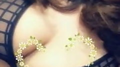 Busty teen licking her boobs