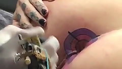 Tatooed her anus